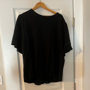 Black top with fun sleeve